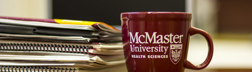 McMaster mug on desk